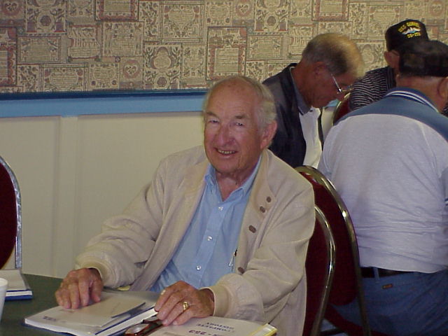 capt. O'Neil looking over our book 'The Complete History of the USS GUNNEL'