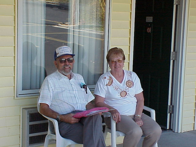 Ray Allen Clark and his wife relax outside their room